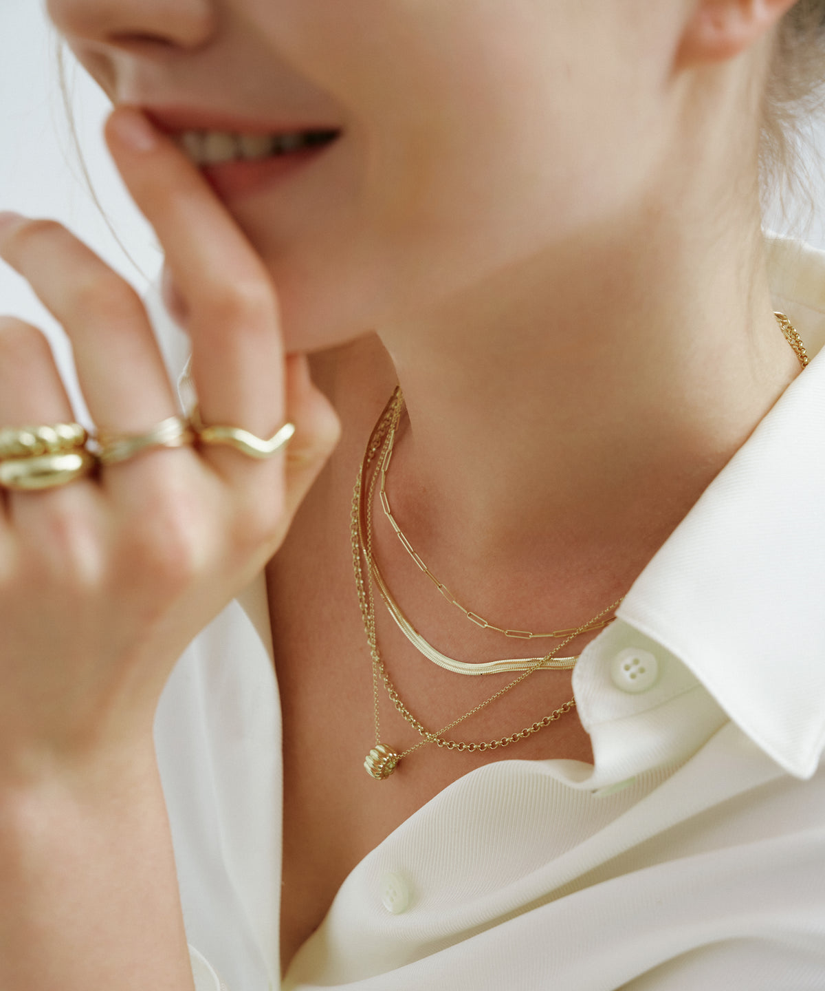 옐로우 골드 | Canelé Necklace, worn, layered, hand at the lips