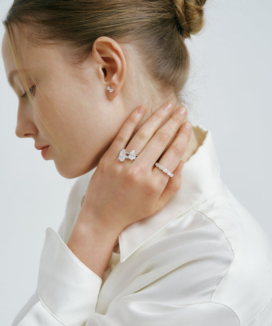 화이트 골드 | Tangent Stud Earrings, worn, hand at the neck