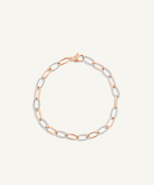 로즈 골드 & 화이트 골드 | shot 1 | Two-tone twist chain bracelet, rose gold with white gold twisted links, on a white background